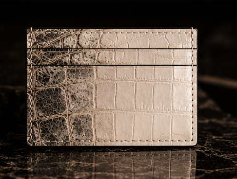 Clean front view of the crocodile cardholder showing the grey-to-pearl gradation