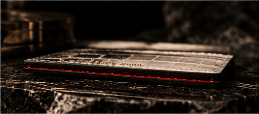 Side profile showing the cardholder's slim form and red interior edge